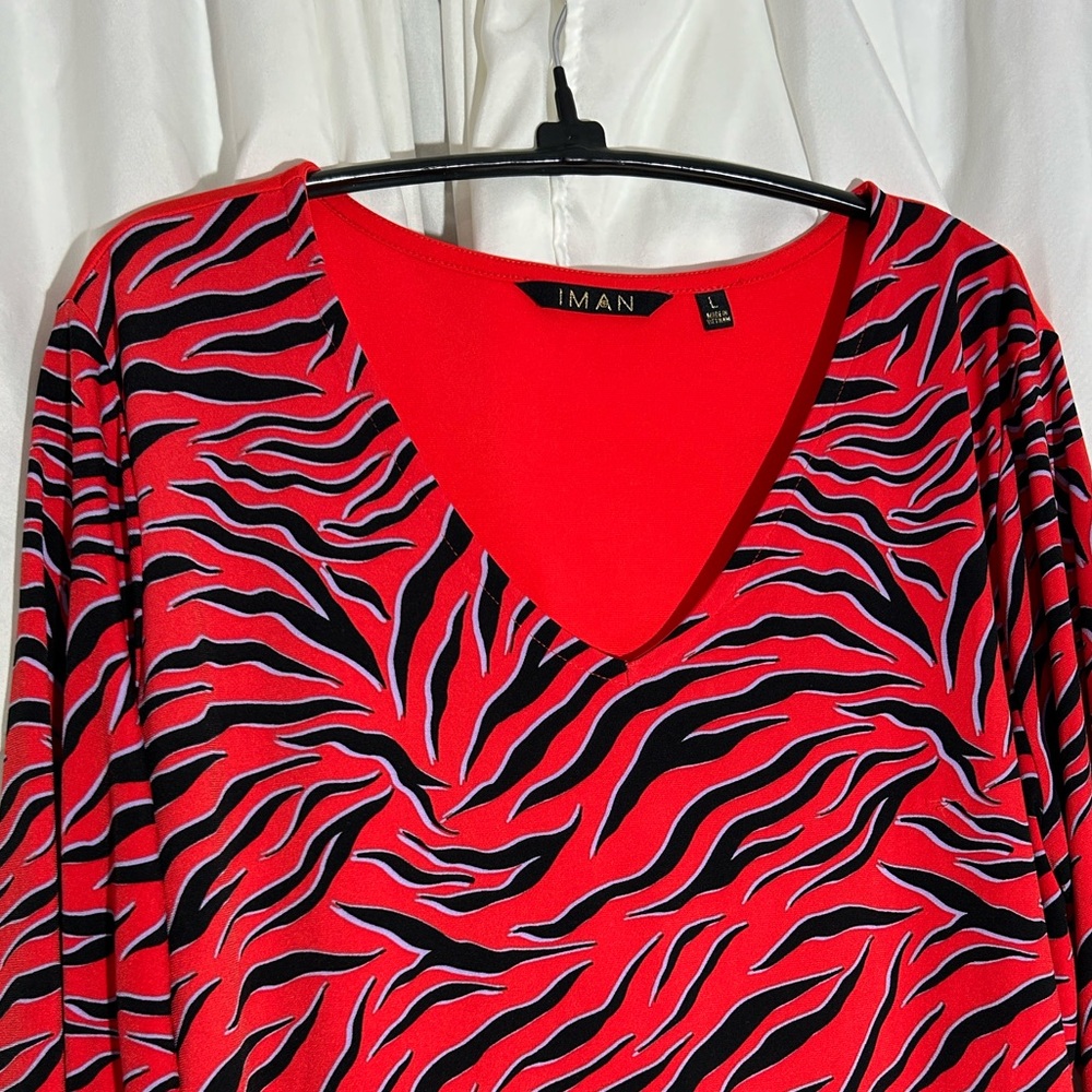 IMAN  women’s large Vibrant Red and Black V neck blouse in excellent condition